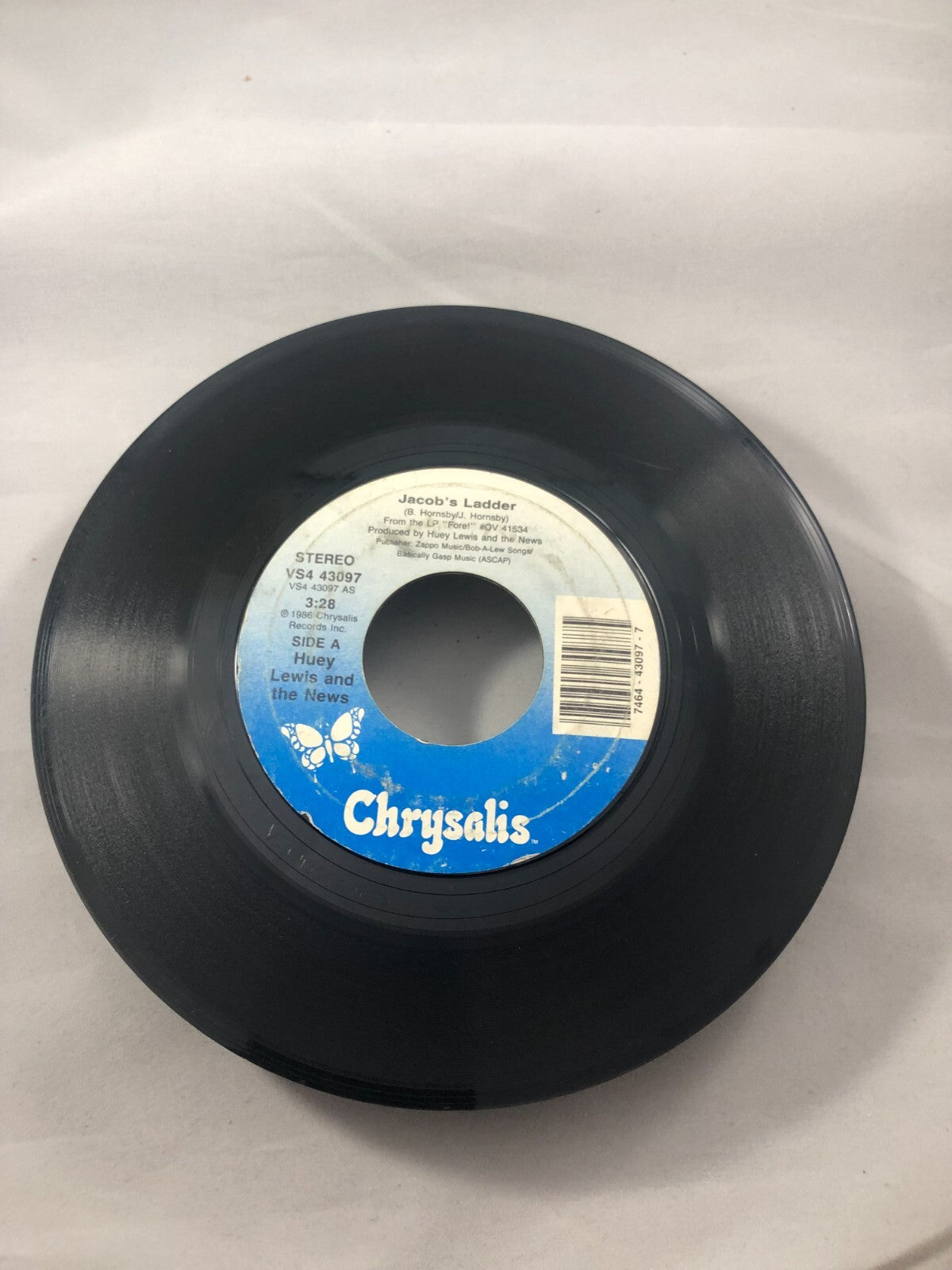 Huey Lewis and The News The Heart of Rock n Roll / Jacob’s Ladder 45 rpm VG