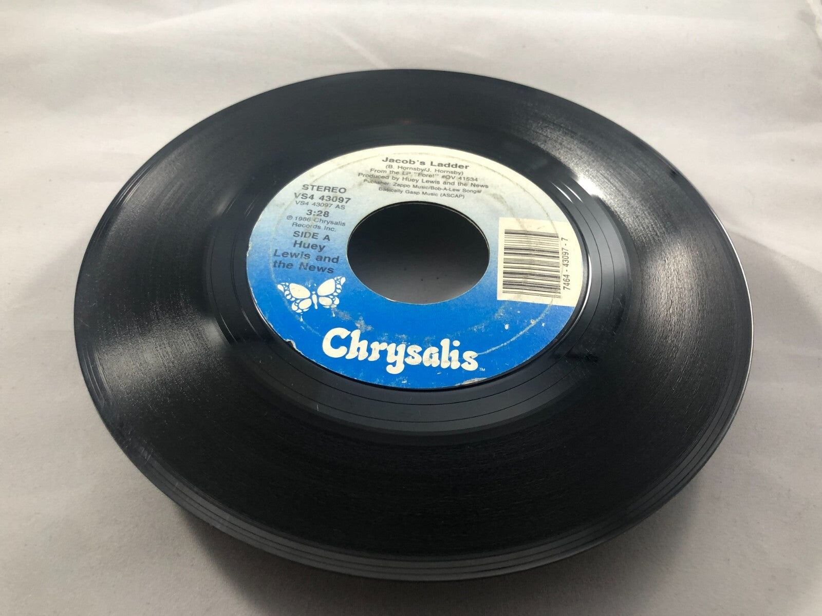 Huey Lewis and The News The Heart of Rock n Roll / Jacob’s Ladder 45 rpm VG