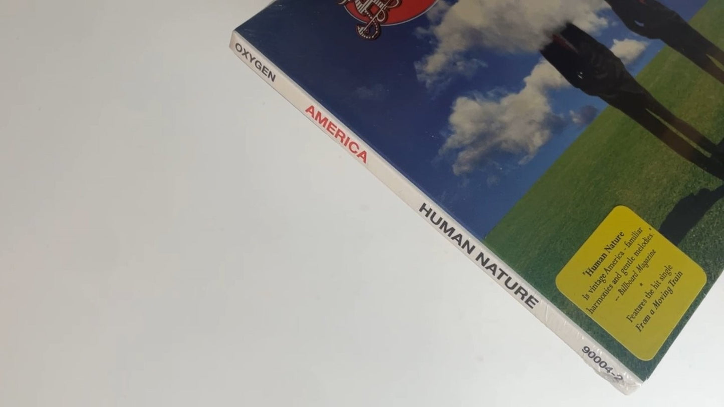 NEW! America - Human Nature CD 1998 Includes Hit Single From a Moving Train Rock